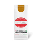 Weiße Kaffeetüte des Cuxhavener Kaffeeroesters mit der Aufschrift Cuxland Barista Espresso vor weißem Hintergrund