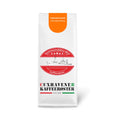 Weiße Kaffeetüte des Cuxhavener Kaffeeroesters mit der Aufschrift Kugelbake Blend vor weißem Hintergrund